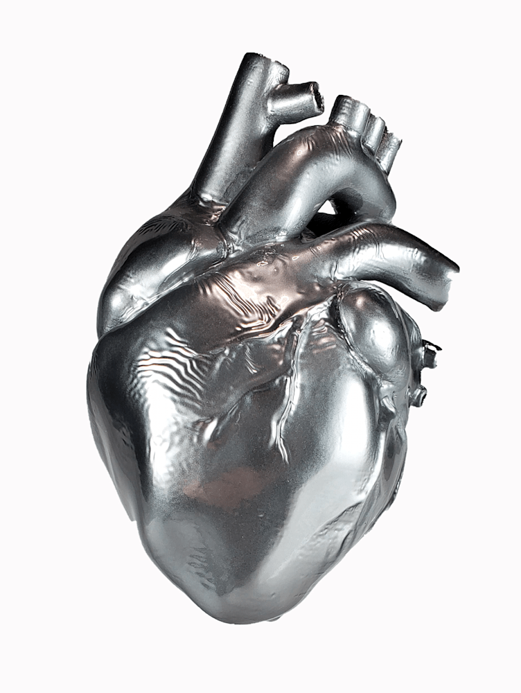 Tin Man's Heart sculpture by Jake Ashley – chromed mixed media artwork with mirror finish