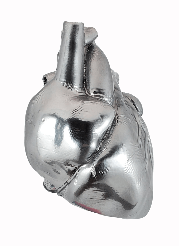 Tin Man's Heart sculpture by Jake Ashley – chromed mixed media artwork with mirror finish